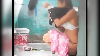 Watch - Desi Village Girl Caught on Camera Taking Outdoor Shower