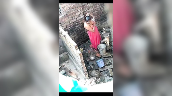 Desi Bhabhi Taking an Open Air Shower Right Next Door!