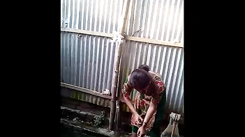 Desi Village Girl's Sexy Open Air Shower Captured on Teen Porn Video