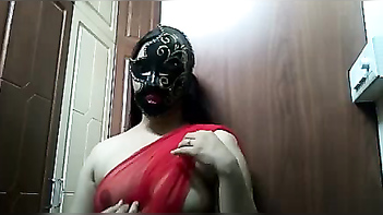 Desi Girl Wows With Sexy Masked Look and Exposed Bust