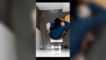Amateur Desi Girl's Pad Change in Bathroom - An Unforgettable Experience