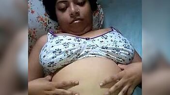 Indian Housewife's Intimate Moment Caught on Camera - Shocking Video!