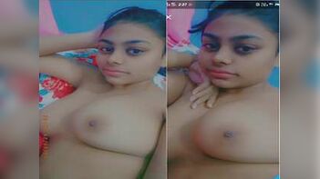 Sultry Desi Girl Flaunting Her Busty Assets