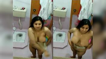 Desi Bitch Caught Soaping Up Her Tits and Pussy in the Shower