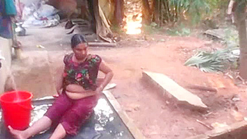Hot Desi South Indian Bhabhi Gets Soaped Up and Rinsed in Outdoor Shower.