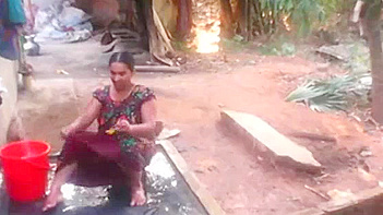 Hot Desi South Indian Bhabhi Gets Soaped Up and Rinsed in Outdoor Shower.