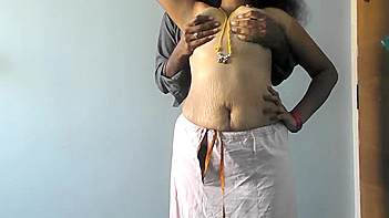 Vinaya Bhabhi Shows Off Her Massive Tits and Tight Pussy in This Wild Mature Indian Sex Video