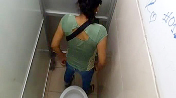 Kinky Indian College Girl Gets Filmed Peeing in the Bathroom, Juicy Details Caught on Tape