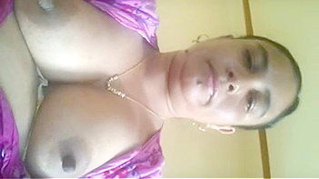 Indian Bhabhi Snapping Juicy Boobs On Phone