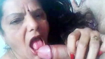 Gujarati Bhabhi Sucks Dick Like a Whore and Takes a Massive Cumshot