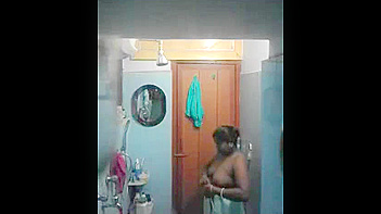 Mature Indian Chick Gets Soaked and Soapy in the Shower