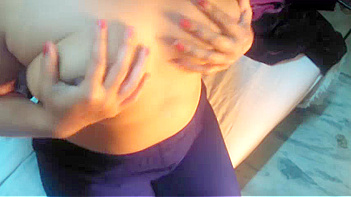 Indian Bhabhi Squeezing Her Juicy Tits In XXX Porn Action