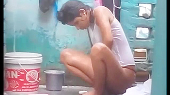 Indian Babe Gets Soaked and Sexy as She Takes a Juicy Outdoor Shower