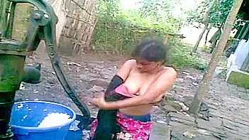 Indian Chick Stripping Down and Washing Up in Public, Damn!