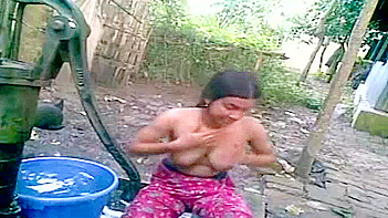 Indian Chick Stripping Down and Washing Up in Public, Damn!