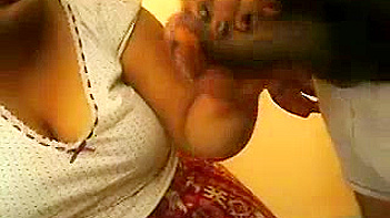 Mature Bhabhi with Huge Tits Sucking Her Man’s Massive Cock Like a Whore