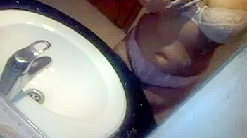 Indian Chick Shows Off Her Huge Tits in the Shower