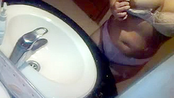 Indian Chick Shows Off Her Huge Tits in the Shower